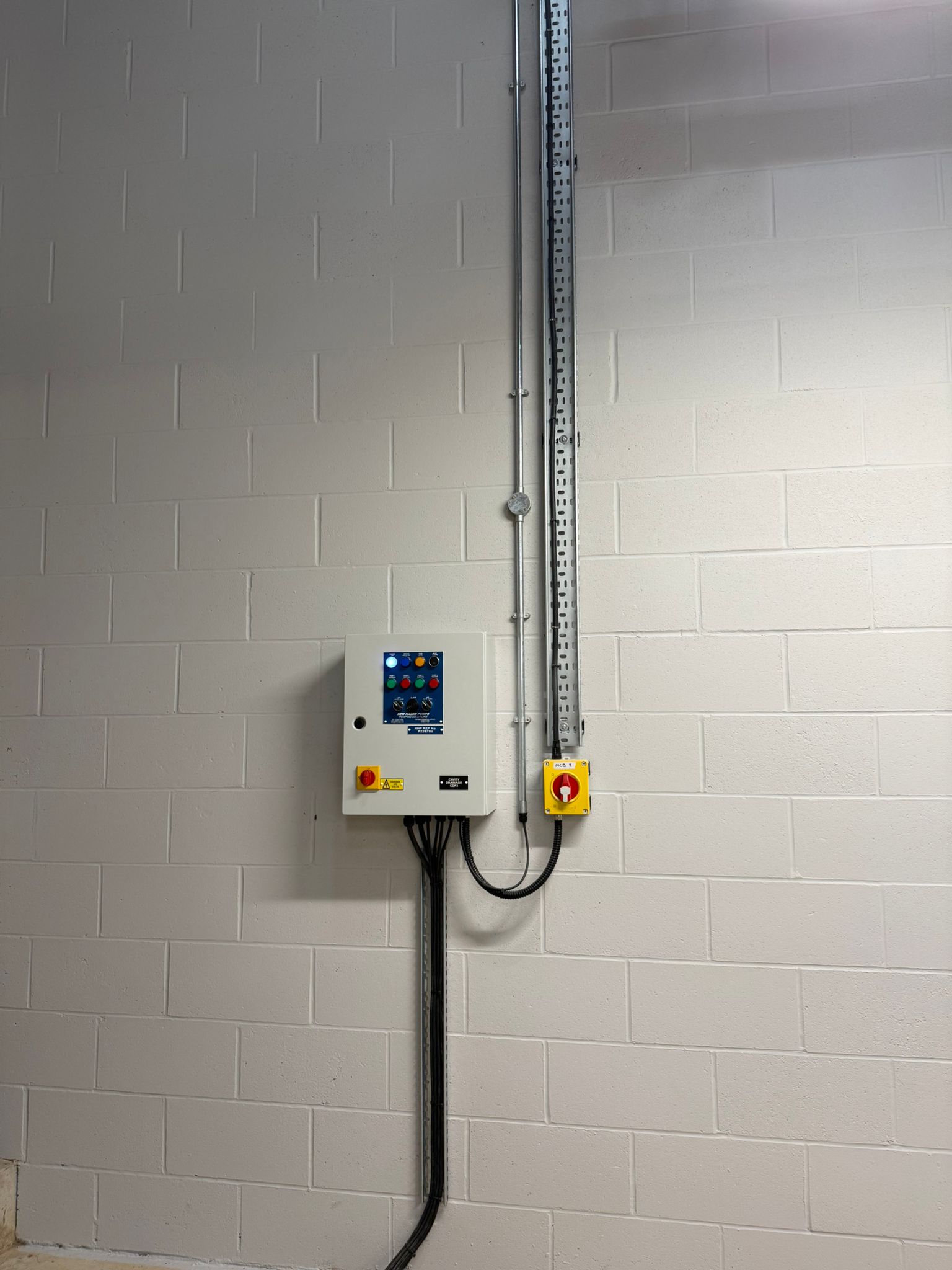 Completed control panel and tidy containment finish